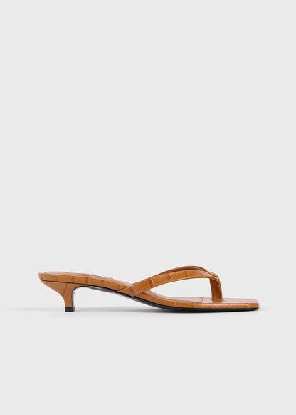 Croco-embossed heeled flip flops tangerine
